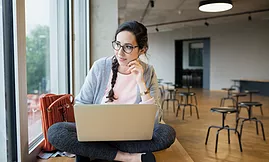 Female-Student-with-Laptop